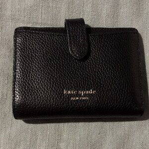 kate spade black pebbled leather snap wallet with gold logo